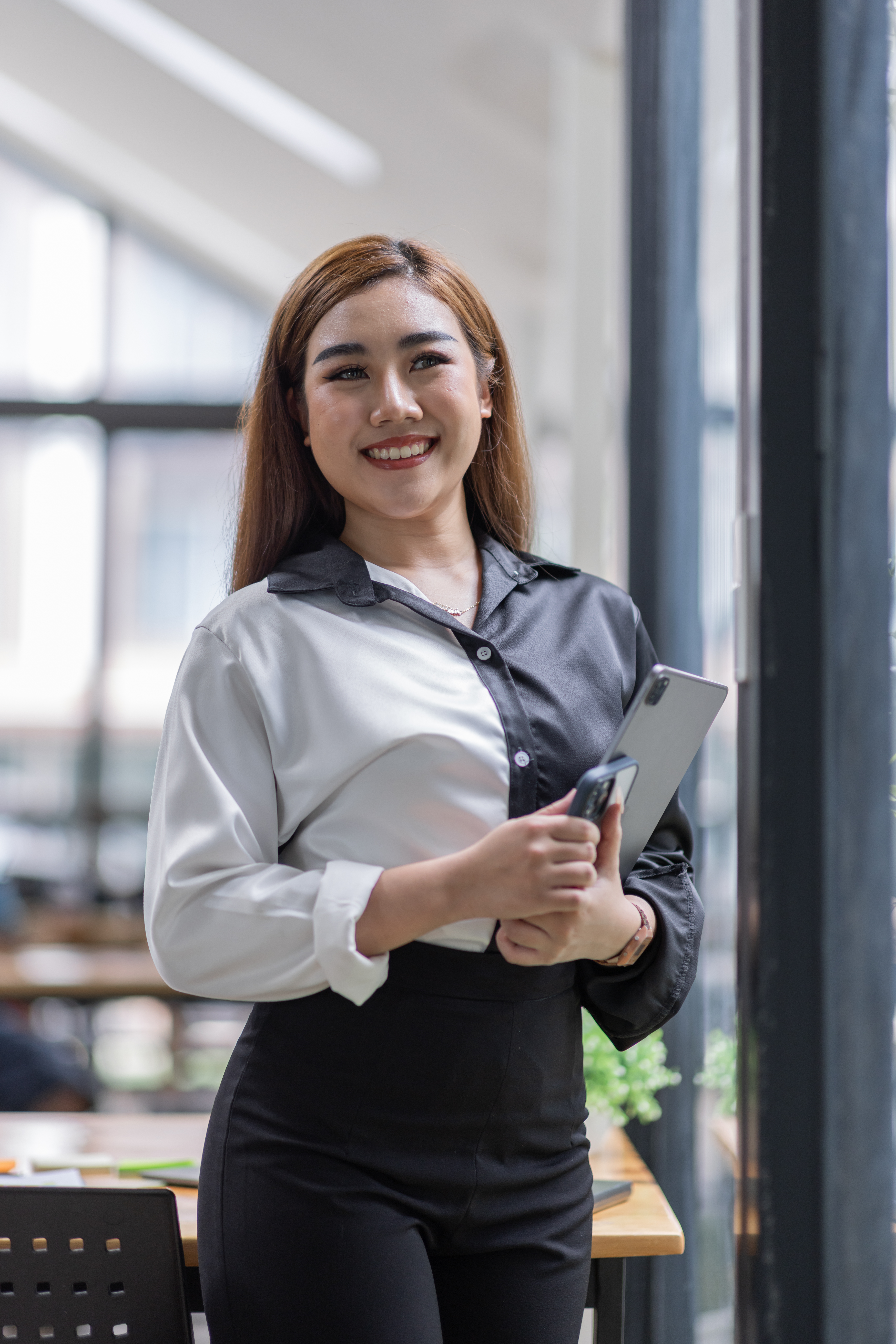 portrait-of-young-business-asian-woman-using-table-2025-02-22-14-49-26-utc
